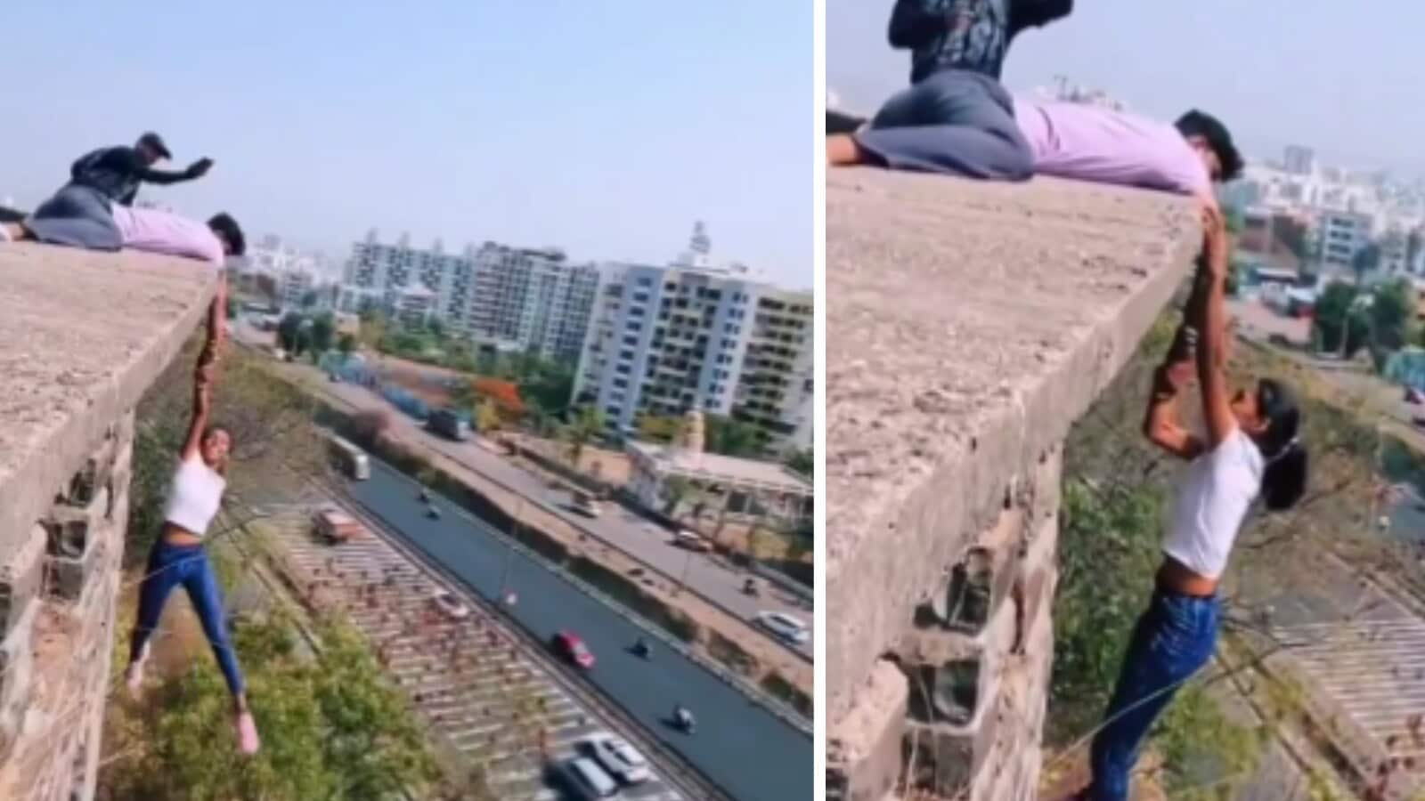 Pune girl hangs from top of building in dangerous stunt. Viral video sparks outrage: ‘Heights of stupidity’ | Trending