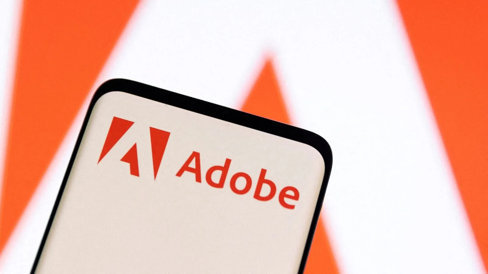 Wall Street: Adobe shares soar 16% on higher annual revenue forecast